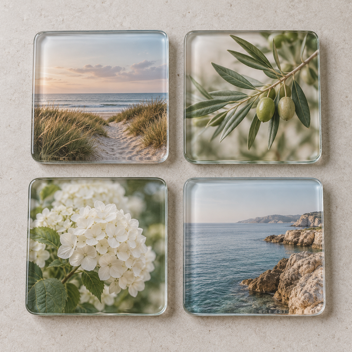 Illustrative set of four personalised glass photo coasters.