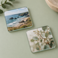 Illustrative set of two personalised glass photo coasters.