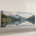 Illustrative panoramic canvas print with a wide mountain landscape.