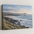 Illustrative single canvas print with a coastal landscape; select the size on the product page.